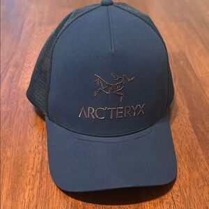 NWOT Arc'teryx Navy Blue Trucker Hat